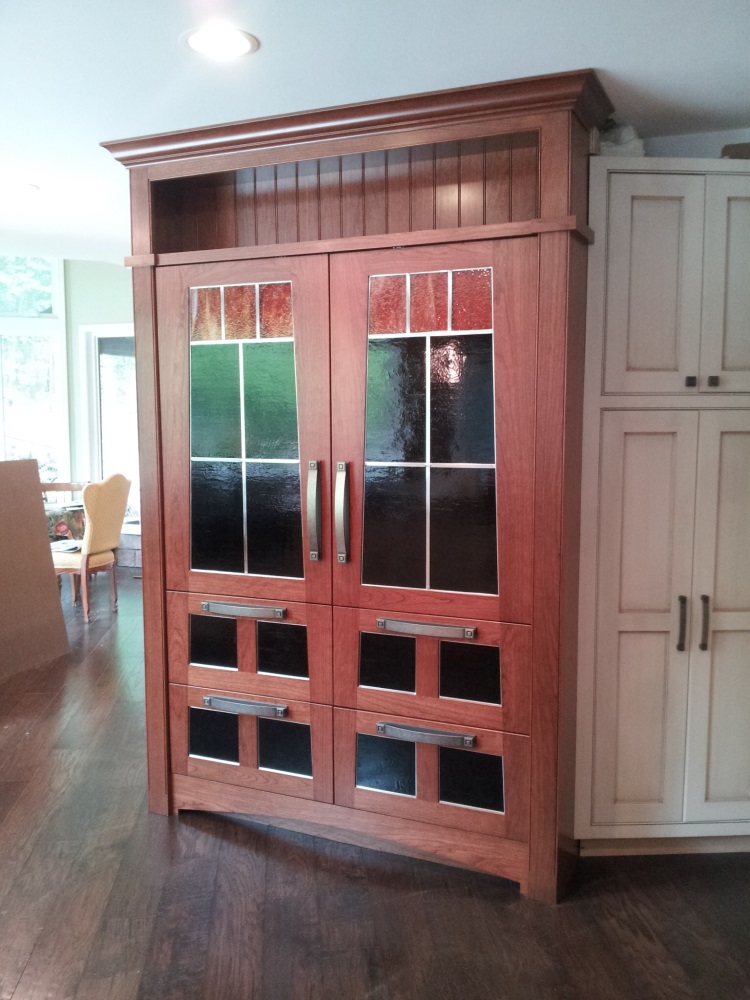 Custom panels for side-by-side refrigerators. Stained glass done by local artisan.